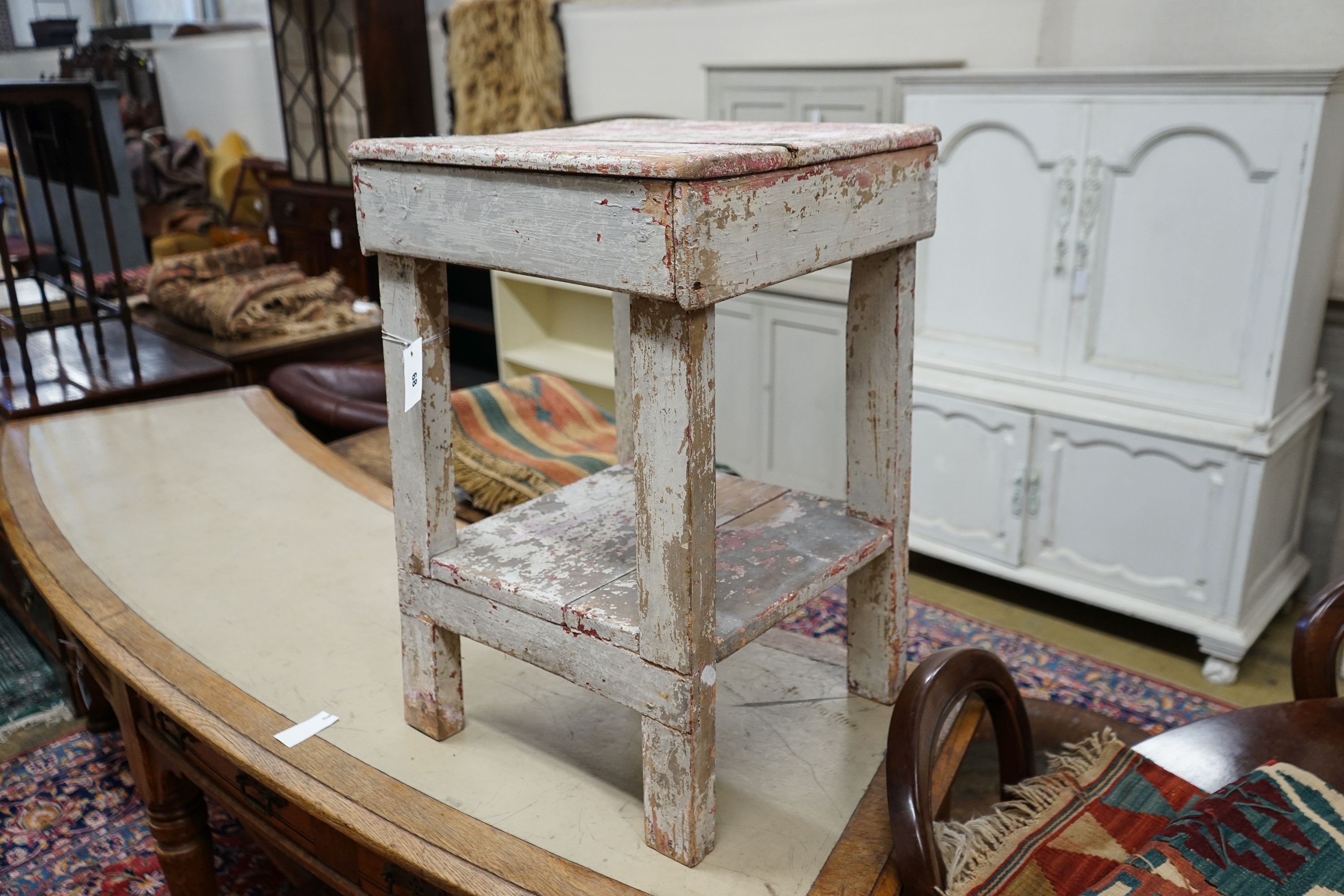 A 19th century French painted pine sculptor's stand, width 45cm, depth 41cm, height 68cm